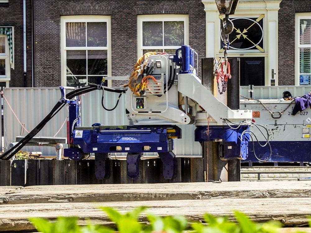 Still Worker in the Netherlands sitting on a pile