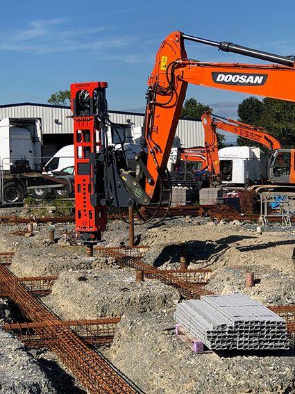 Excavator and Piling Hammer in action